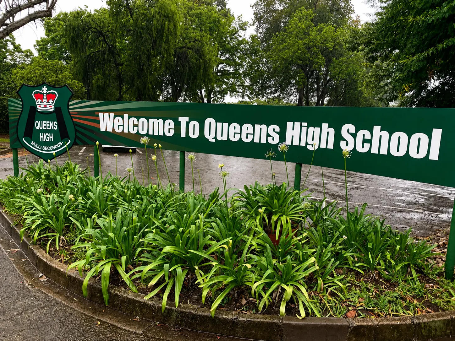 Welcome sign at Queens High School